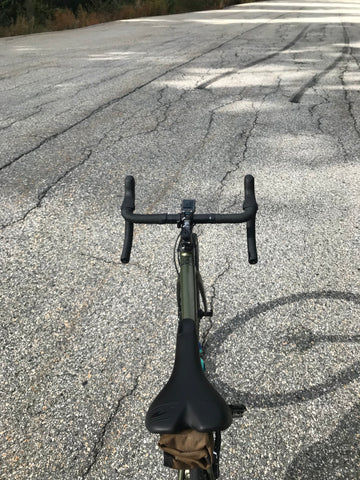 Detail shot of Prologo saddle and top tube and some other stuff