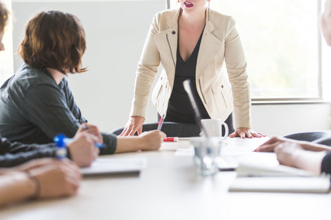 Woman runs a brainstorming session