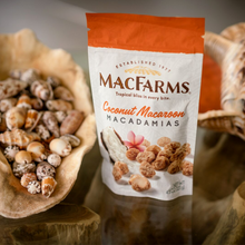 Load image into Gallery viewer, coconut macaroon macadamias on table by shells