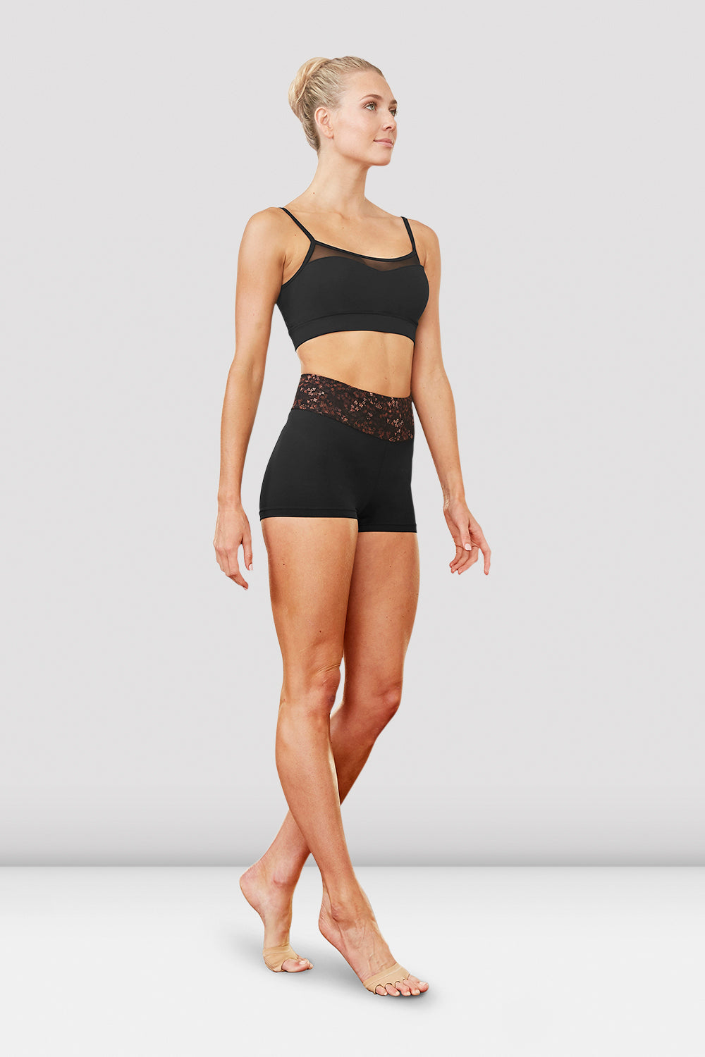 A female dancer wearing the Ladies Armelle high waist briefs and Ladies Becca camisole crop top