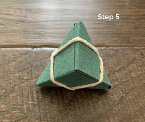 step 5- zongzi rice dumpling origami how to, wrap string around the triangle