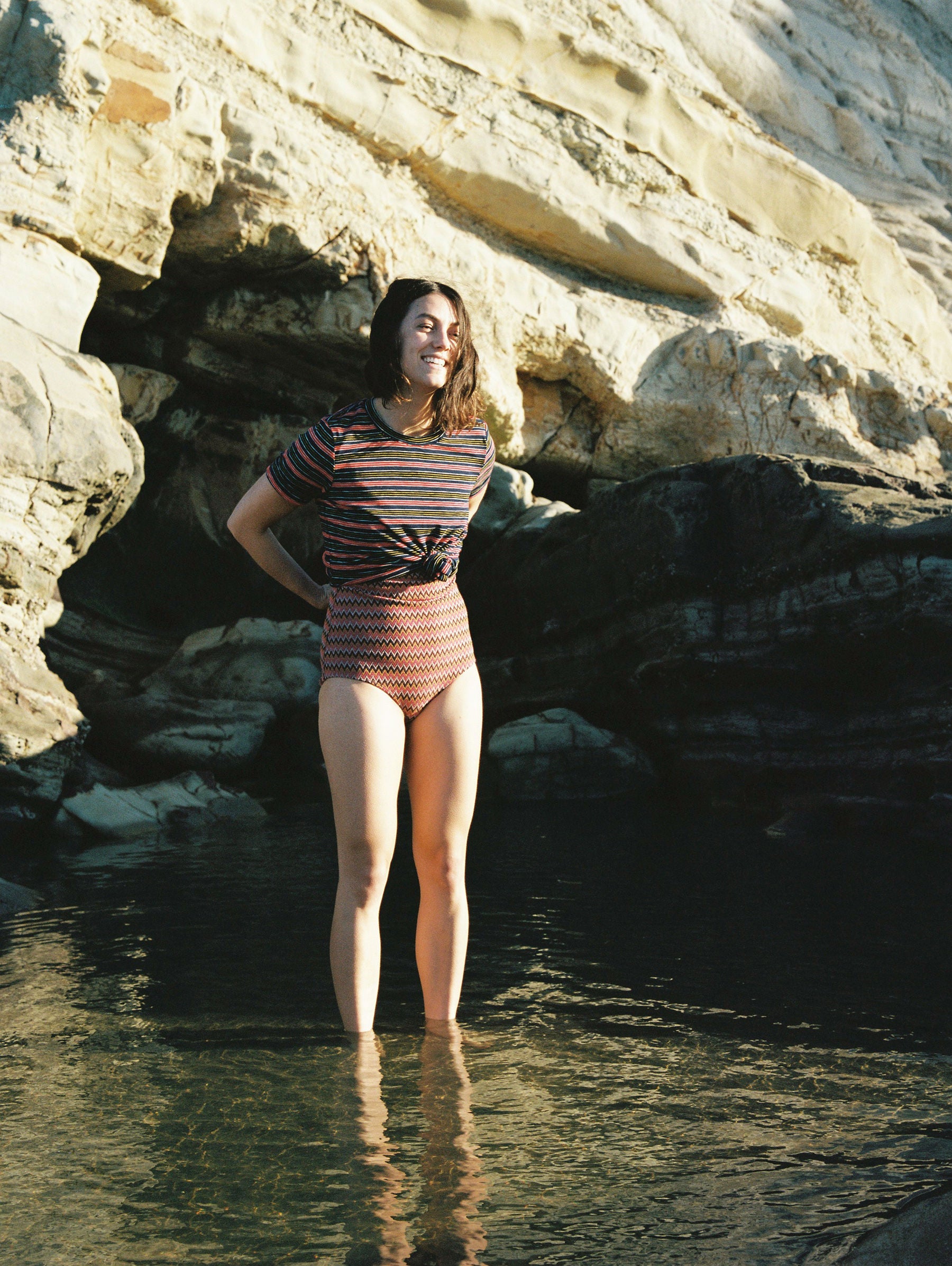 Raukura wears Stripey Tee & Chevron Bathers.