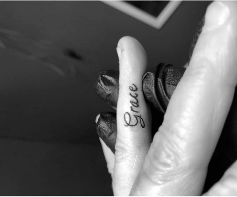 Small Script Inside Finger Tattoos