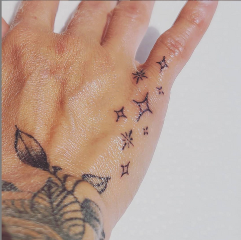 Small Sparkle Tattoo Finger