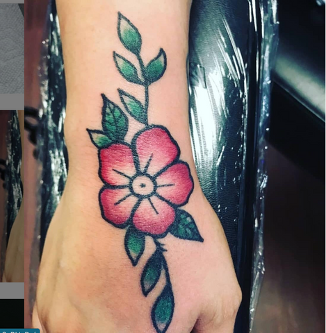 Color Flower Hand Tattoo