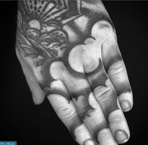 Hand and Finger Cloud Tattoo