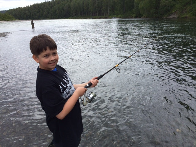 Danial Hillenburg fishing in river