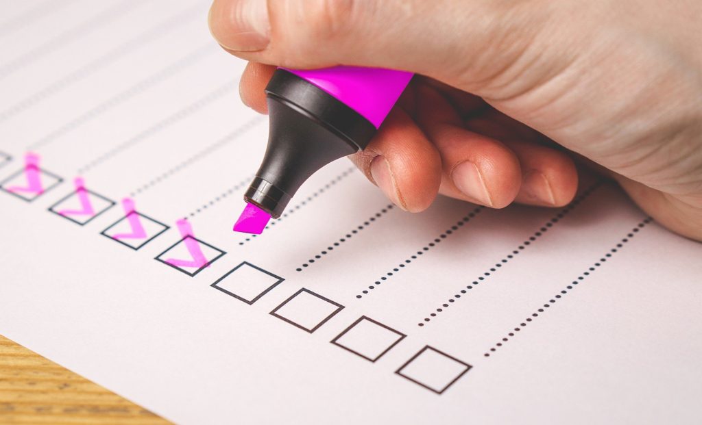 Checklist with pink highlighter
