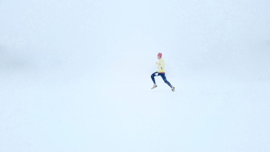 person running in snow