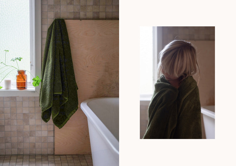 Mosegrønne håndklær på badet til innholdsprodusent Linn Ellevseth.