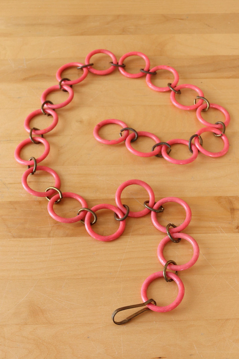 pink belt chain