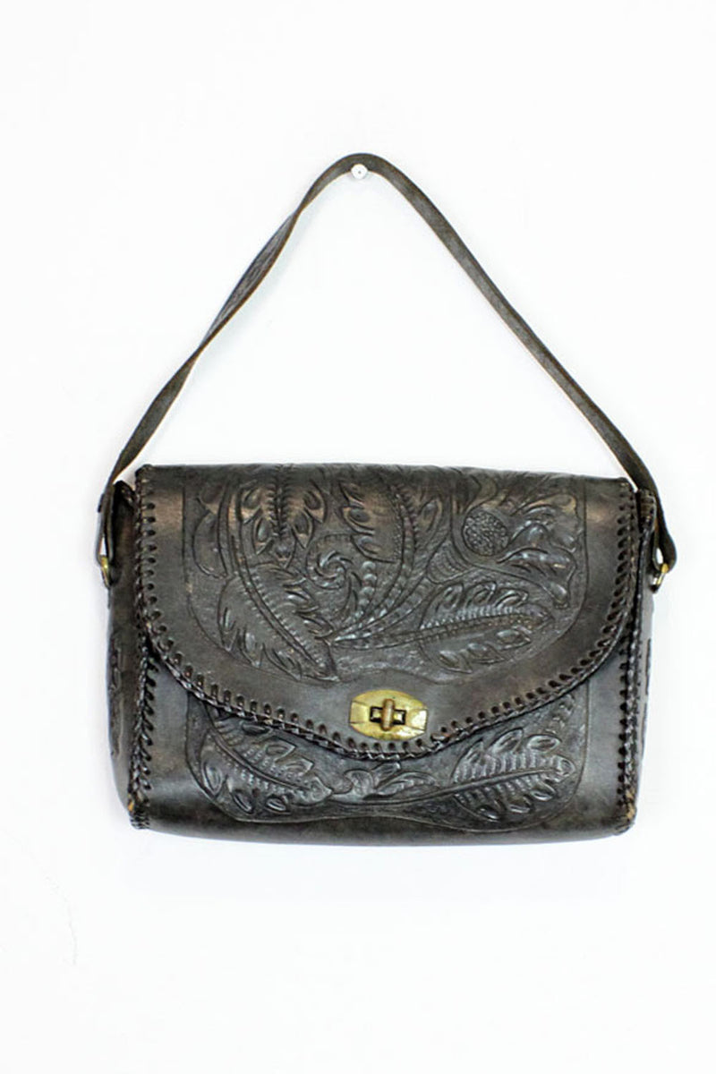 black tooled leather purse