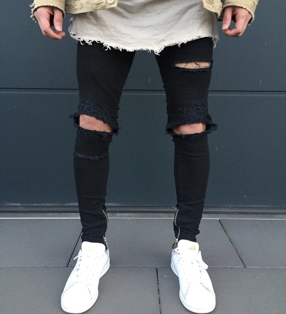 black jeans with ripped ankles
