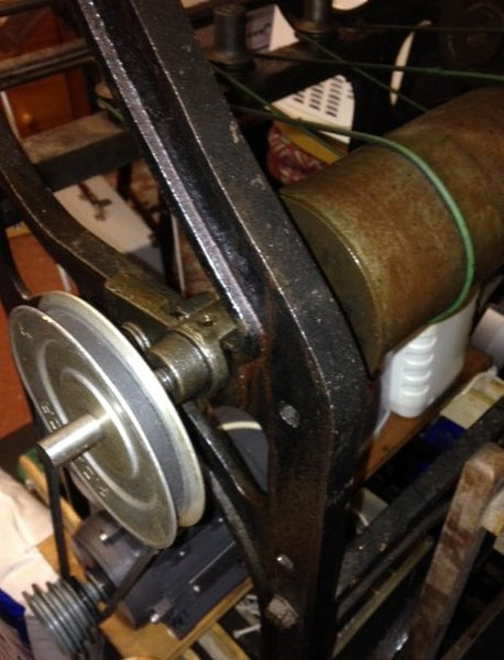 green wharf belt and top pulley