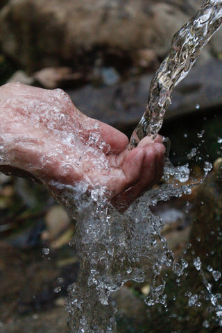 alt="Weirdo Good gives back donating to organizations including Charity Water which provides clean drinking water in developing nations"