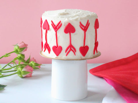 Heart arrows made out of fondant for Valentine's Day cake decoration