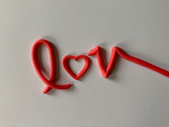 love spelled out in fondant