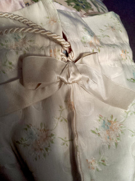 bow covering raw end of drawstring