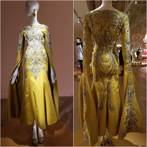 Guo Pei yellow dress with crazy sleeves.