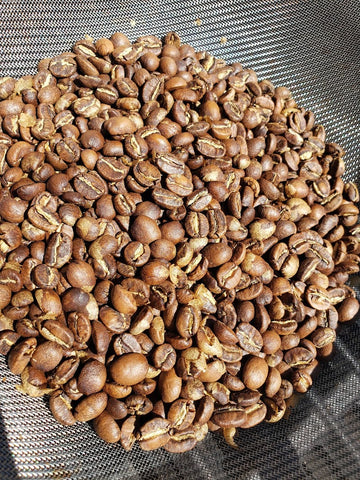 light roasted coffee, roasted at home with a hot air gun and flour sifter