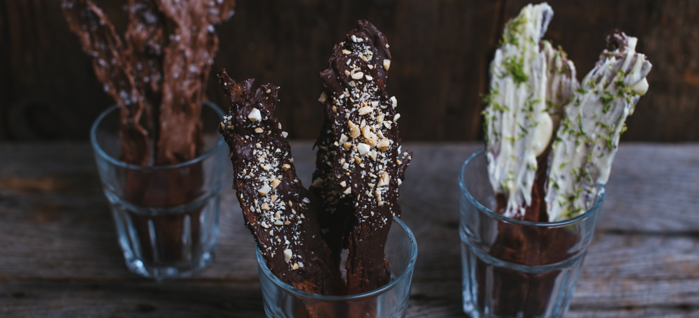 chocolate-covered bacon bouquets in glasses