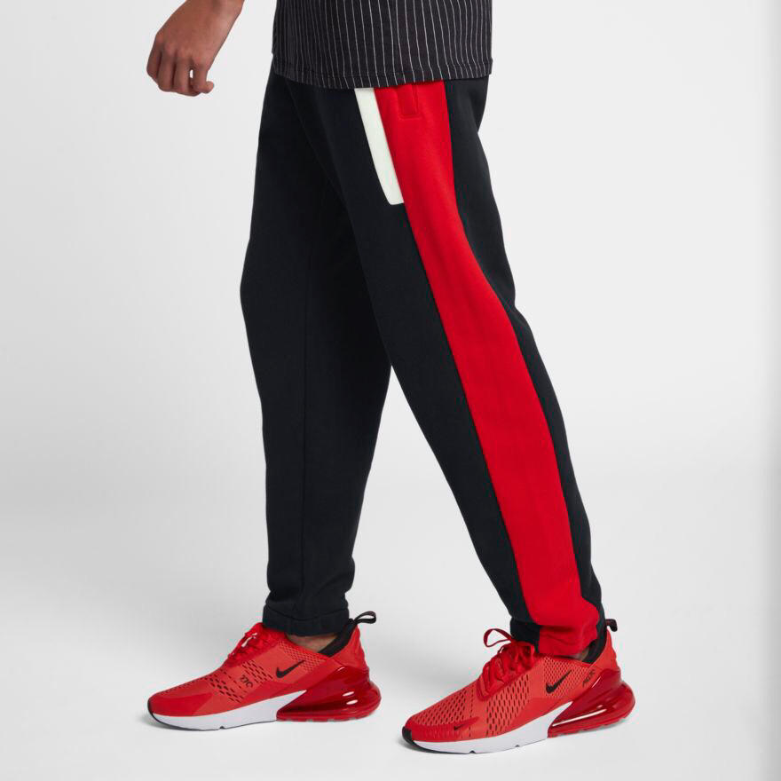 pantaloni nike con striscia laterale