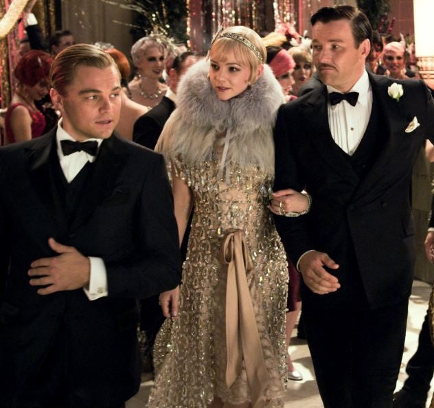 Jay Gatsby wearing suit in party scene taken from The Great Gatsby Film