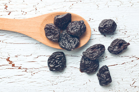 are prunes good for dogs to eat