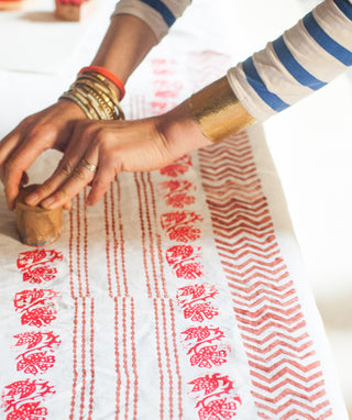 molly mahon hand block printing a table runner for a dinner party