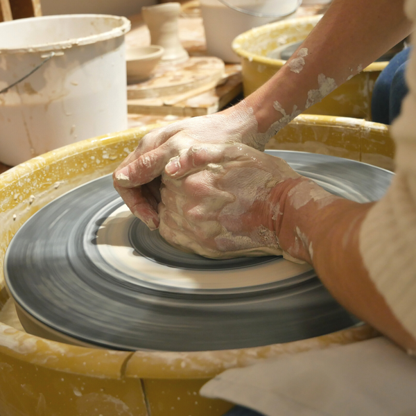 Creating pottery pieces for the first time at Alpharetta pottery studio A.C. Studios