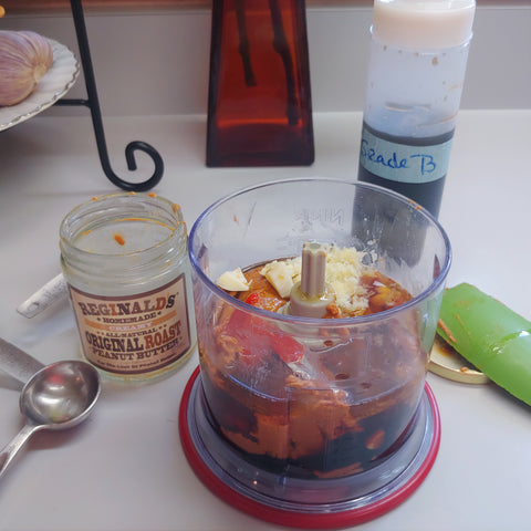 Peanut sauce ingredients in a small Ninja food processor.