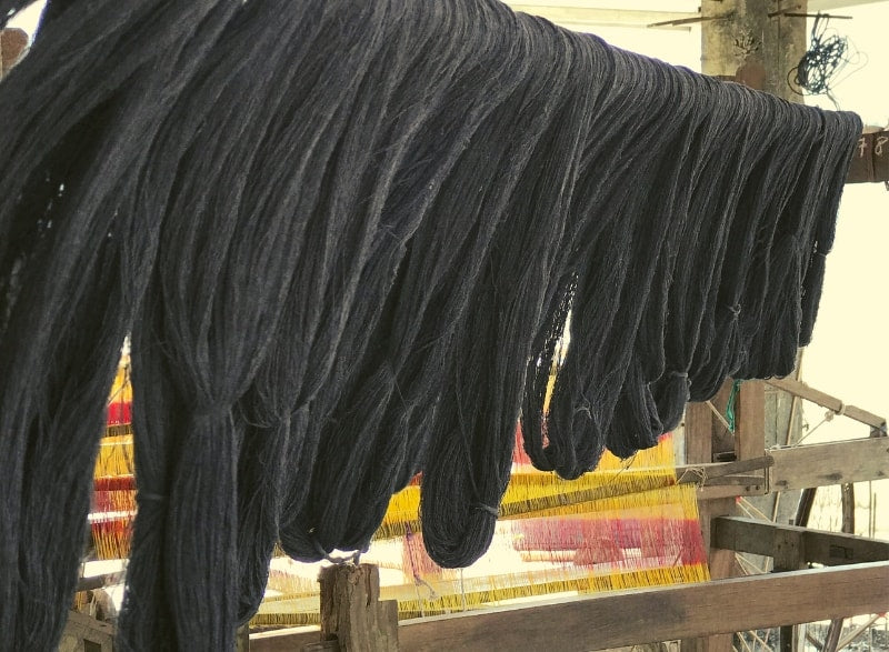charcoal gray eri silk yarn died with iron ore natural and hand dyed