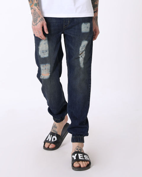 chalk blue ripped denim joggers