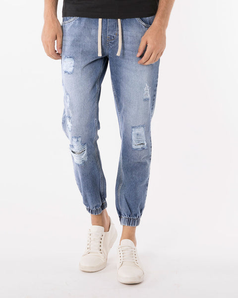 chalk blue ripped denim joggers