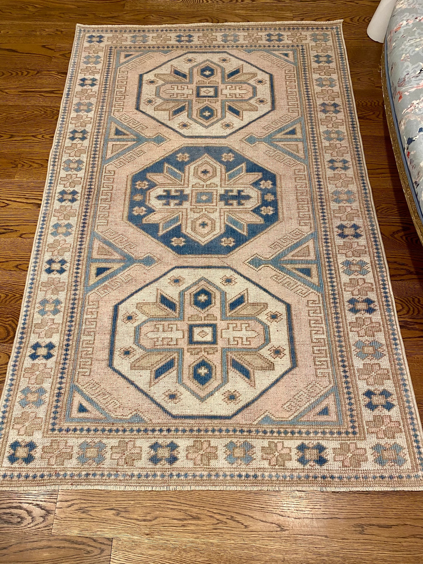 4’0”x6’4” Pink, blue, and cream area rug