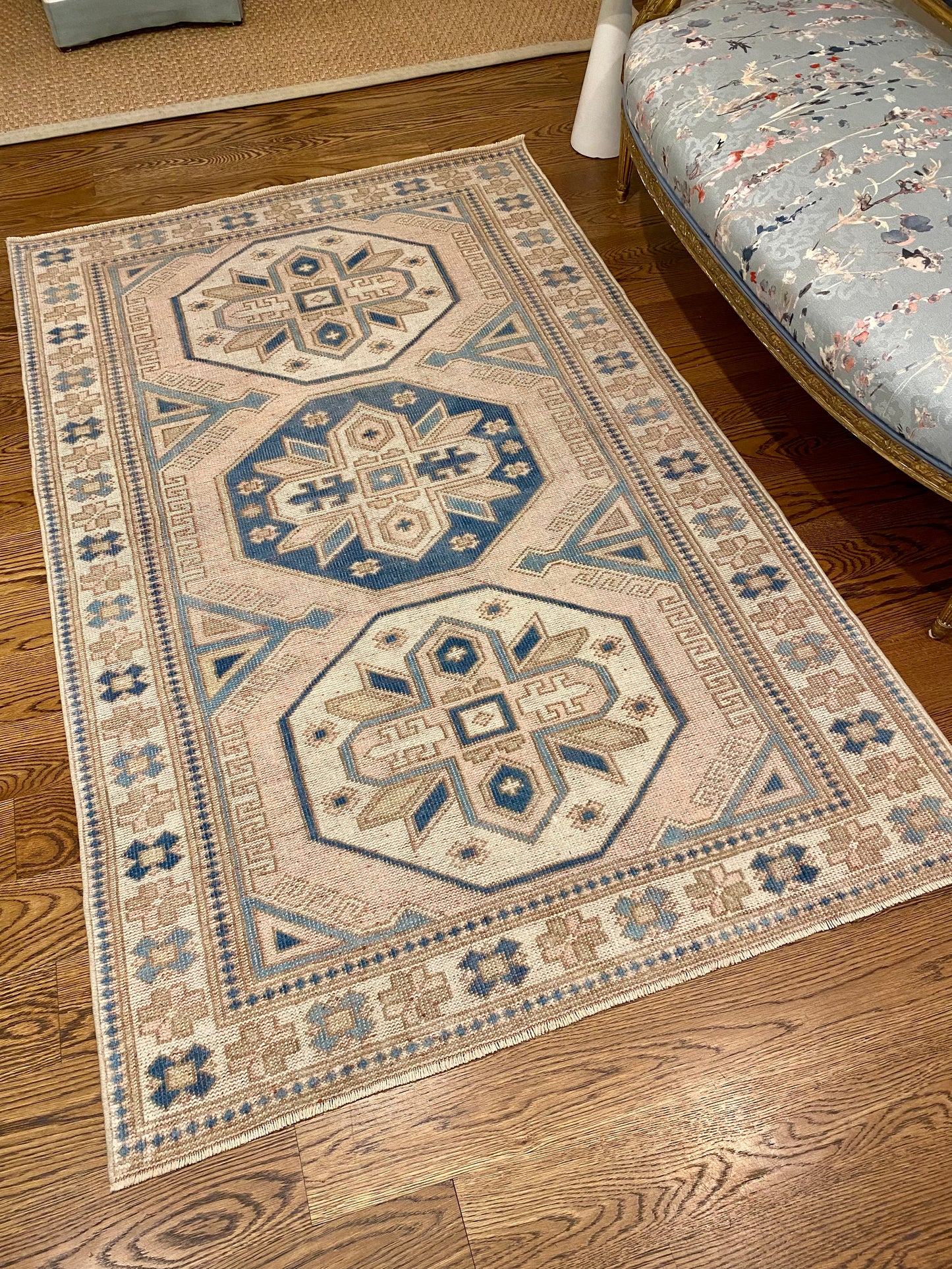4’0”x6’4” Pink, blue, and cream area rug