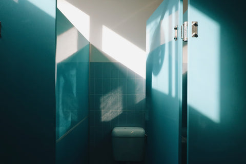 blue toilet stall public restroom partition
