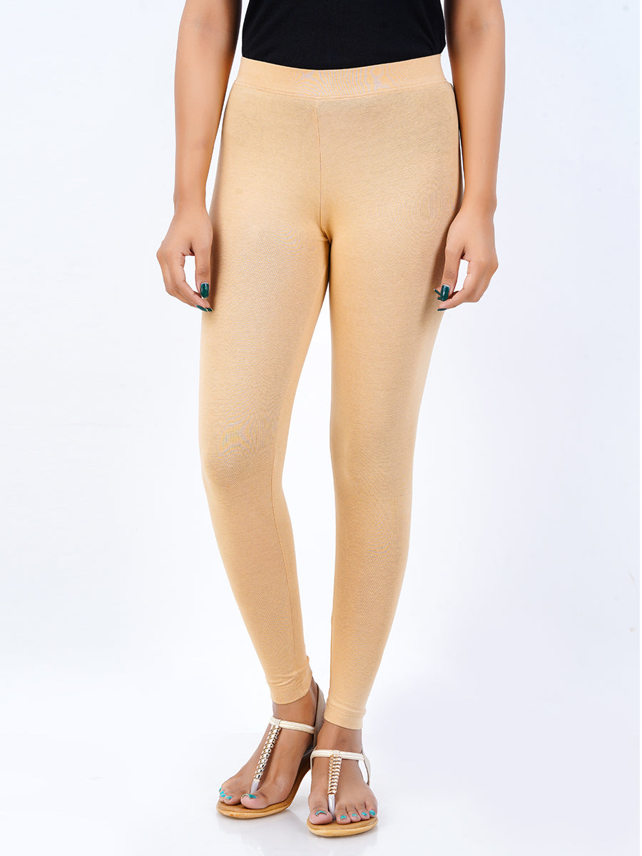 Women cream solid casual churidar leggings