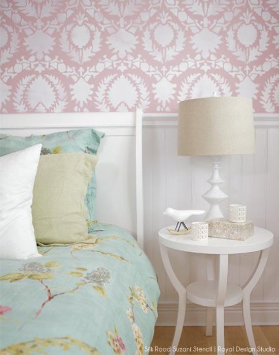 Pink and white bedroom wall stencil with Silk Road Suzani Stencil from Royal Design Studio