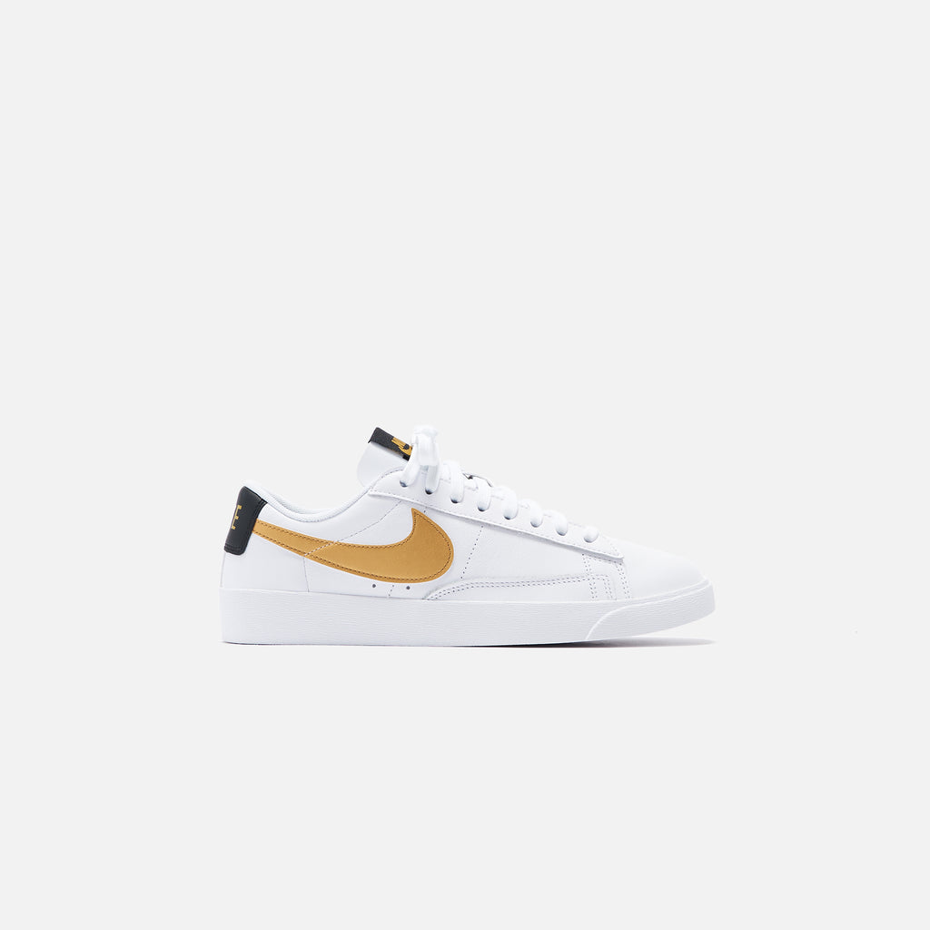 nike blazer low womens gold