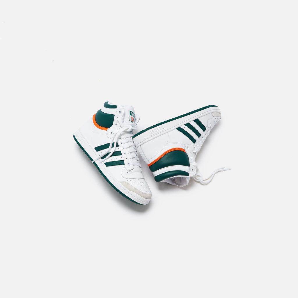 white and green adidas top ten