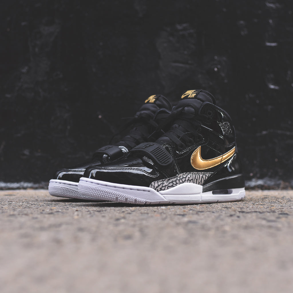 air jordan legacy 312 black and gold