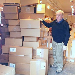 John McLeod with shipping boxes