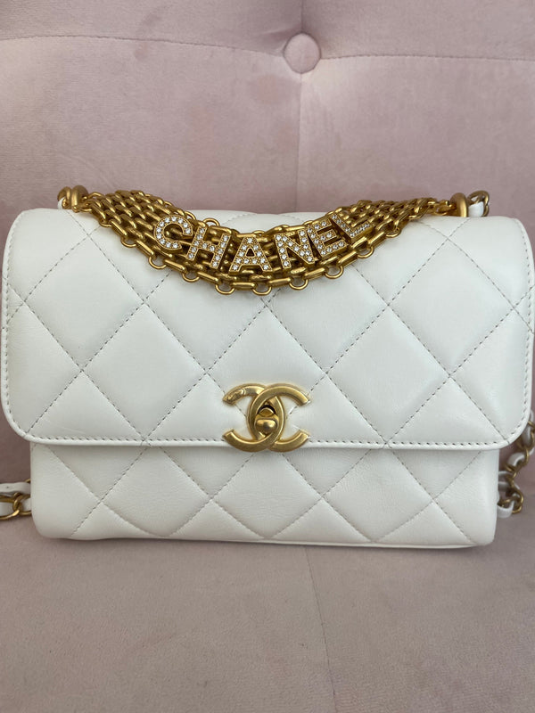 LuxuryPromise Chanel White Quilted Lambskin Crystal Logo Chain Flap Bag
