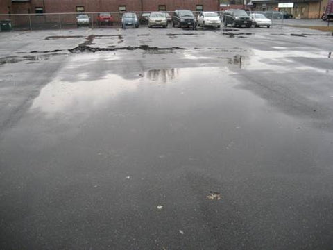 sweep wet parking lot