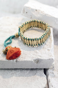 Where The Wilde Things Are handmade gold link bracelet - brightly coloured cotton and tassel clasp as features