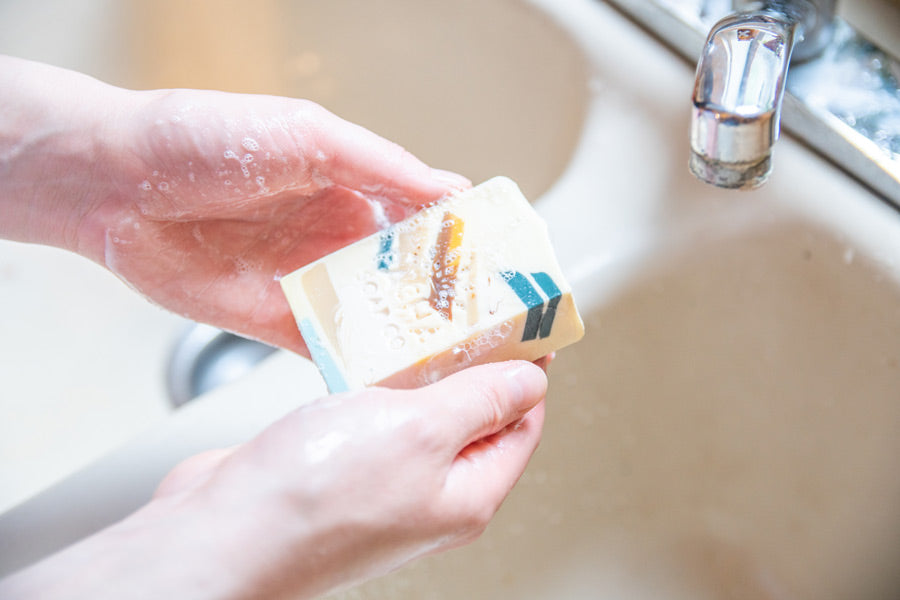 Person Washing Hands with Pachafetti Bar Soap