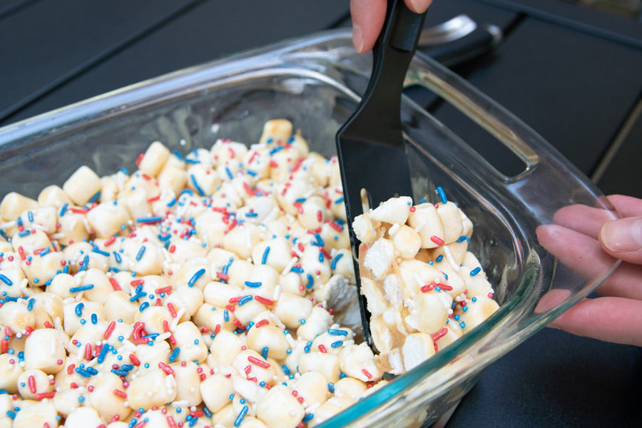 Cutting a Piece of Confetti Bar