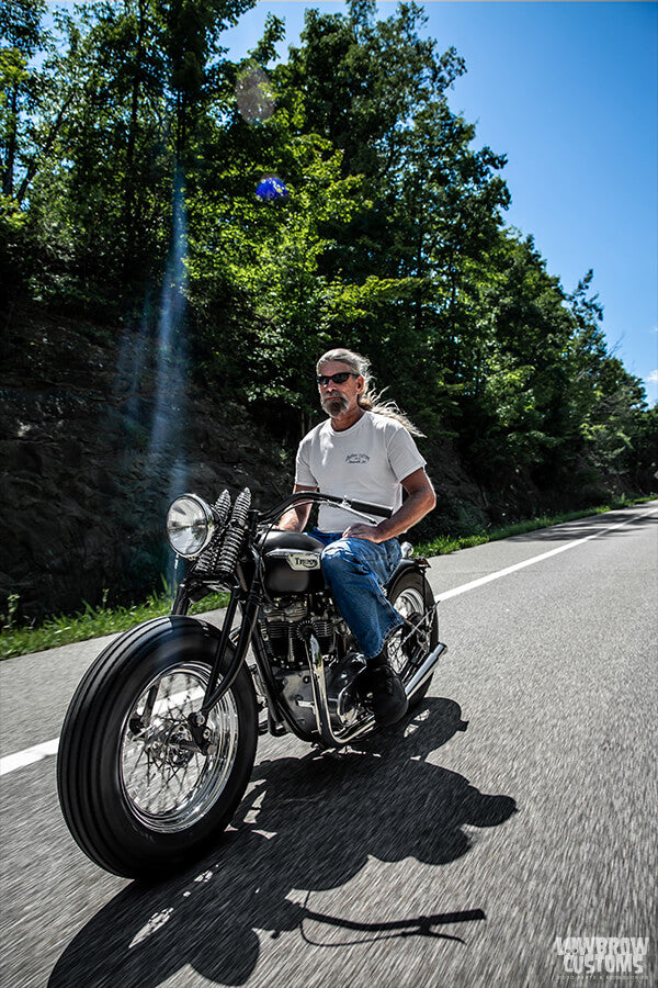 Todd having fun riding his Custom 1968 650cc Triumph Bonneville Bobber