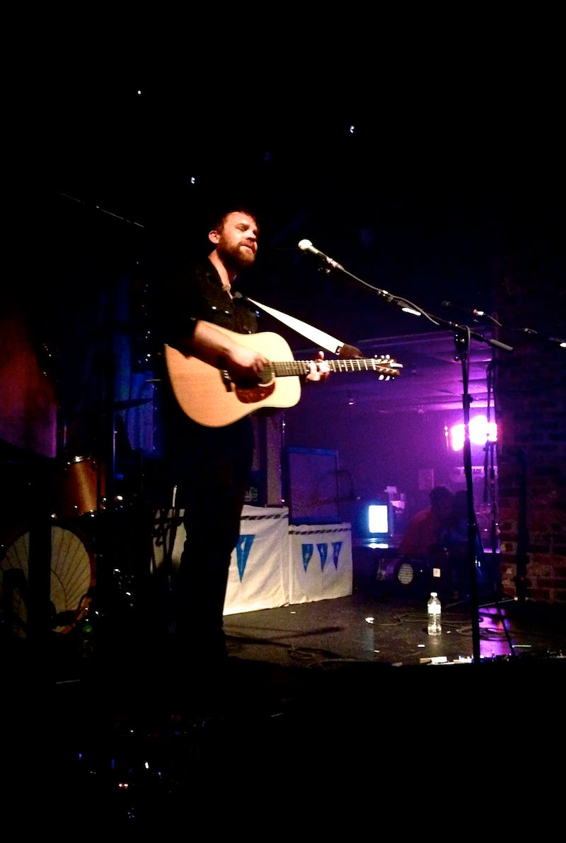 Scott Hutchinson from Frightened Rabbit used the solid guitar strap in tan on his Martin during their show at Freebird.